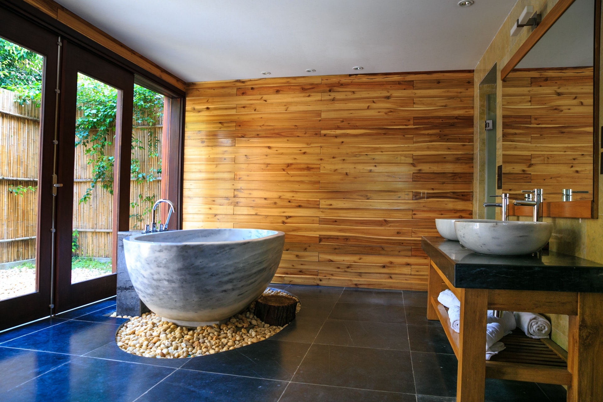 bathroom with wooden wall